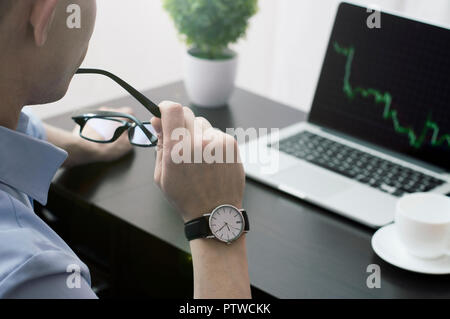 Trader working in the office. Stock Photo