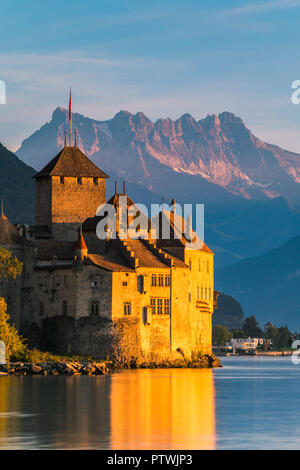 Chillon Castle (French: Château de Chillon) is an island castle located on Lake Geneva (Lac Léman), south of Veytaux in the canton of Vaud. Stock Photo