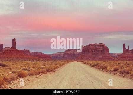 The red sand and rock monoliths of Monument Valley, Utah USA Stock ...