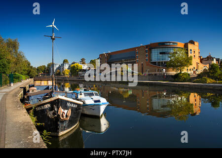 UK, Kent, Maidstone, Town Centre, boats moored on River Medway opposite Fremlin Walk shopping centre Stock Photo