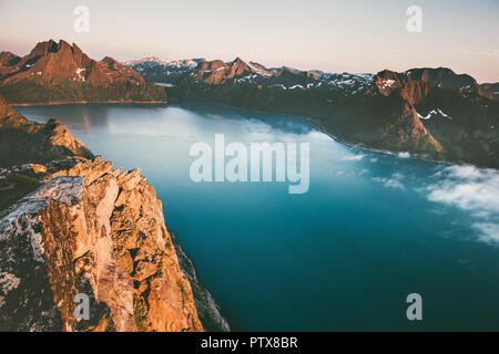 Landscape mountains and sea fjord sunset scenery in Norway aerial view Travel exploring Senja islands