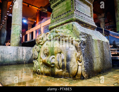 Sideways head of Medusa in the subterranean Basilica Cistern, also known as Yerebatan Sarnici. Istanbul, Turkey. Stock Photo
