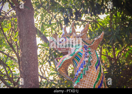 Colorful singha guardian or antique thai's style lion statue at Wat Phra That Doi Suthep, Chiang Mai, Thailand. Singha or Thai styled lion guardian st Stock Photo