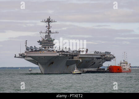 US Navy warship, the aircraft carrier USS Harry S Truman (CVN 75) at anchor in The Solent to visit Portsmouth, UK between the 6th-10th October 2018. Stock Photo