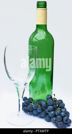Still Life with wine glass, bottle and fresh grapes