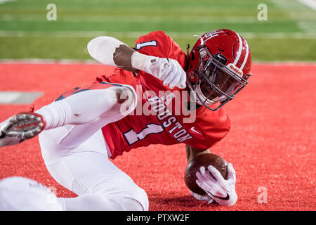 Houston wide receiver Bryson Smith left makes a catch against