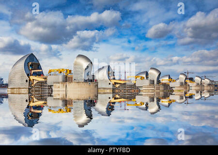 5 March 2015: London, UK - Thames Barrier reflected in the River Thames. Stock Photo