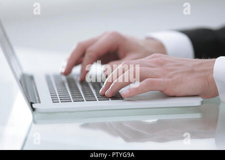 close up hands multitasking man using laptop connecting wifi Stock Photo