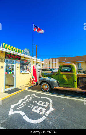 Barstow, California, USA - August 15, 2018: vintage Dodge Truck at historic Route 66 Motel in Barstow on Route 66, the city's Main Street in San Bernardino County. Vertical shot. Stock Photo