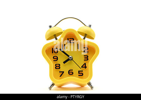 Yellow watch with five petals. Alarm clock on a white background Stock Photo