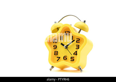 Yellow watch with five petals. Alarm clock on a white background Stock Photo