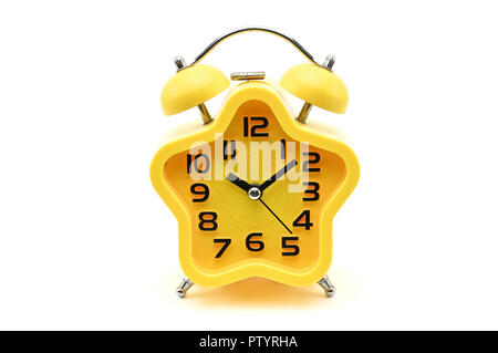 Yellow watch with five petals. Alarm clock on a white background Stock Photo