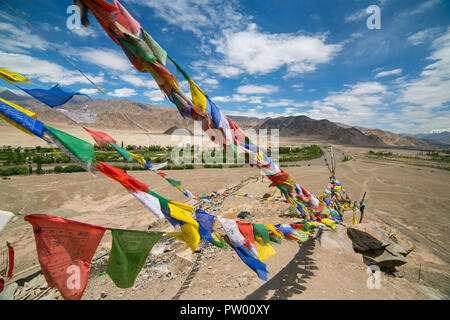 Leh, Ladakh - June 26, 2017: Colorful Buddhist prayer flags with Tibetan prayers on it in monastery near Leh, Ladakh, India Stock Photo