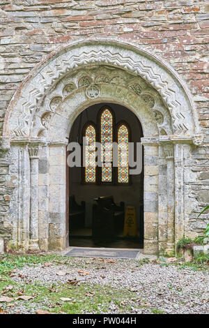 Norman arched entrance to the twelfth century church of St Anthony at the headland of St Anthony's Head on the Roseland, Cornwall, England. Stock Photo