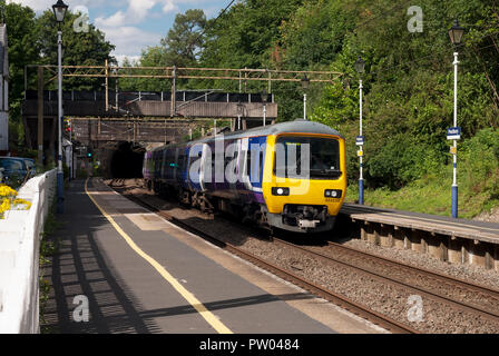 Hunslet Class 323 unit on a Manchester to Stoke-on-Trent service at Prestbury station, Cheshire. Stock Photo