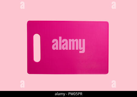 Pink Kitchen Board on pink paper carton Stock Photo