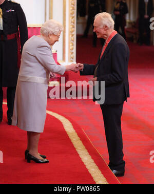 Mr. Bamber Gascoigne from Richmond is made a CBE (Commander of the Order of the British Empire) by Queen Elizabeth II, during an Investiture ceremony at Buckingham Palace, London. Stock Photo