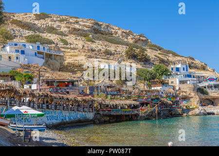 Matala, Greece - September 25, 2018: Famous hippies Matala Beach, Crete Island Stock Photo