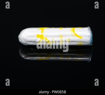Reading, United Kingdom - July 08 2018:   A tampon still in it's plastic wrapper Stock Photo