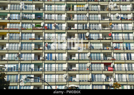Frame filling image of identical flats with satellite dishes, seen in Berlin, Germany. Stock Photo