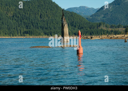 Red port navigation buoy on Stave Lake in Mission, British Columbia, Canada Stock Photo