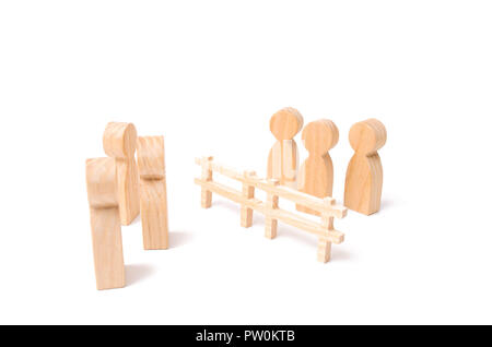 Negotiations of businessmen. A wooden fence divides the two groups discussing the case. Termination and breakdown of relations, breaking ties. Contrac Stock Photo