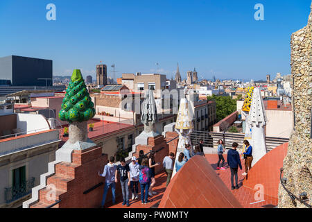 Visitors on the roof of Antoni Gaudi's Palau Guell, El Raval, Barcelona, Spain Stock Photo