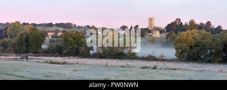 View over Cotswold town of Chipping Campden with St James' church and Dover's Hill on frosty autumn morning