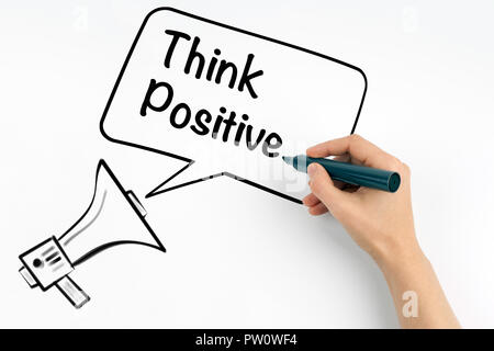 think positive concept. Megaphone and tex Stock Photo