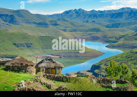 Lesotho traditional hut house homes in Lesotho village in Africa. Beautiful scenic landscape of village in daytime with typical huts built by villager Stock Photo
