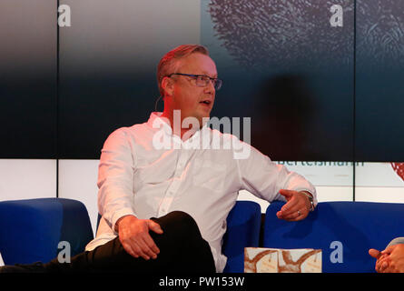 Frankfurt, Germany. 11th October 2018. Swedish author Jonas Jonasson speaks at a talk at the Frankfurt Book Fair. The 70th Frankfurt Book Fair 2018 is the world largest book fair with over 7,000 exhibitors and over 250,000 expected visitors. It is open from the 10th to the 14th October with the last two days being open to the general public. Stock Photo