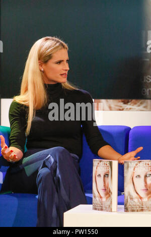 Frankfurt, Germany. 11th October 2018. Swiss television hostess Michelle Hunziker speaks at a talk at the Frankfurt Book Fair. The 70th Frankfurt Book Fair 2018 is the world largest book fair with over 7,000 exhibitors and over 250,000 expected visitors. It is open from the 10th to the 14th October with the last two days being open to the general public. Stock Photo