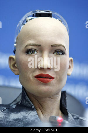 Kiev, Ukraine. 11th Oct, 2018. The humanoid robot Sophia speaks at a press conference in Kiev. The robot Sophia arrived to Ukraine to take part in the final of the all-Ukrainian competition of developers of robotics and artificial intelligence (AI) as jury member and meeting with Ukrainian Prime Minister Volodymyr Groysman. Humanoid robot Sophia was granted citizenship in Saudi Arabia, making her the first robot in the world to receive citizenship. Credit: Pavlo Gonchar/SOPA Images/ZUMA Wire/Alamy Live News Stock Photo