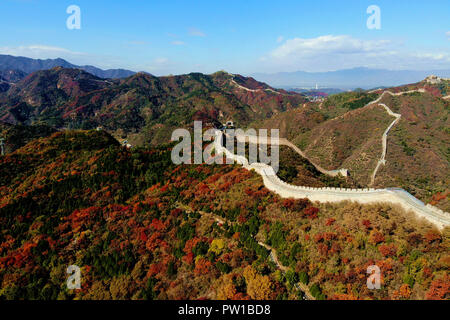 Beijing, China. 10th Oct, 2018. Aerial photo taken on Oct. 10, 2018 shows a view of the Badaling section of the Great Wall in the Badaling red leaf scenic area in the Yanqing District of Beijing, capital of China. Credit: Wang Tiezhong/Xinhua/Alamy Live News Stock Photo