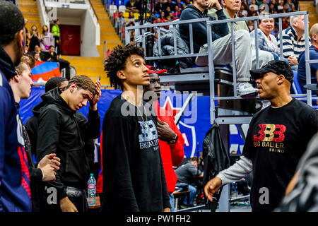 Moscow, Russia. 11th Oct, 2018. Lavar Ball, father of Los Angeles Lake guard Lonzo Ball, presents a framed shirt of Big Baller Brand to CSKA Moscow after his team played CSKA Moscow-2 the previous day as part of the JBA League (Junior Basketball Association) world tour. Credit: Nicholas Muller/SOPA Images/ZUMA Wire/Alamy Live News Stock Photo