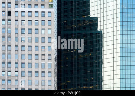 10-2018 Manhattan, New York. Office buildings reflected in the windows of other office buildings. Photo: © Simon Grosset Stock Photo