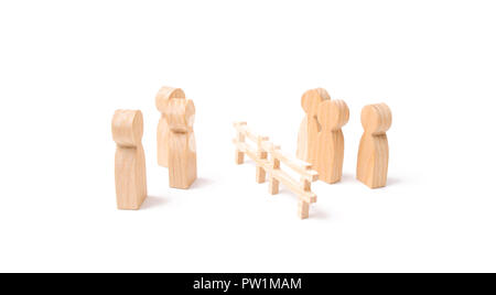 Negotiations of businessmen. A wooden fence divides the two groups discussing the case. Termination and breakdown of relations, breaking ties. Contrac Stock Photo