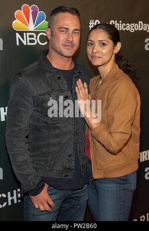 Miranda Rae Mayo and Taylor Kinney of " Chicago Fire" attend the NBC