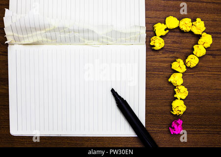 Design business concept Empty copy text for Web banners promotional material mock up template. Notebook marker crumpled papers forming question mark w Stock Photo