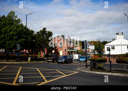 Junction intersection of kings drive B5171 and wollton street and speke road at woolton cross woolton Liverpool Merseyside England UK Stock Photo