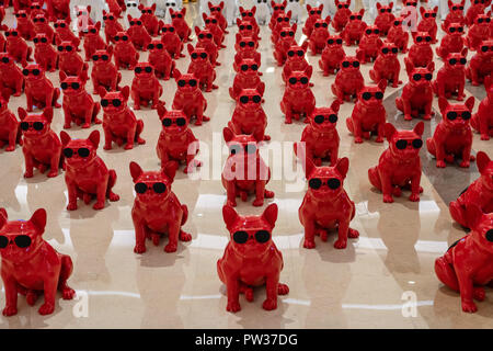 Dogbots (electronic robot dogs) on display for sale at shopping mall in China Stock Photo