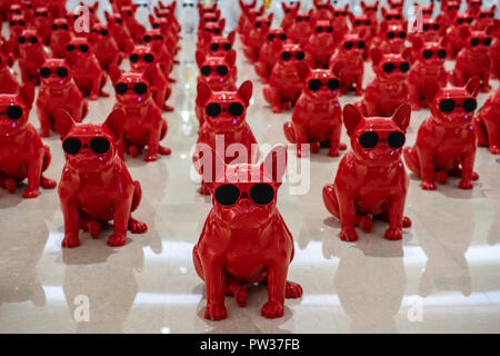 Dogbots (electronic robot dogs) on display for sale at shopping mall in China Stock Photo