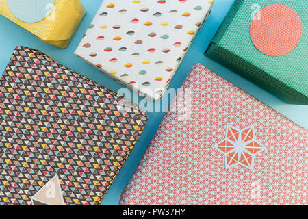 Christmas present gift boxes on blue background Stock Photo