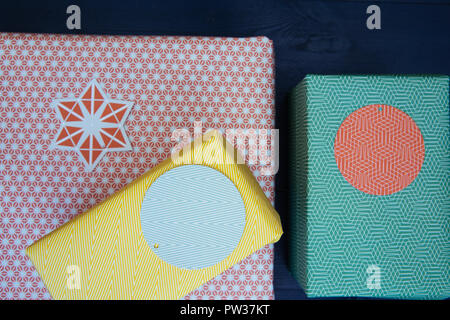 Christmas present gift boxes on dark background Stock Photo