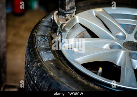 Seasonal tyre replacement. Tire service Stock Photo