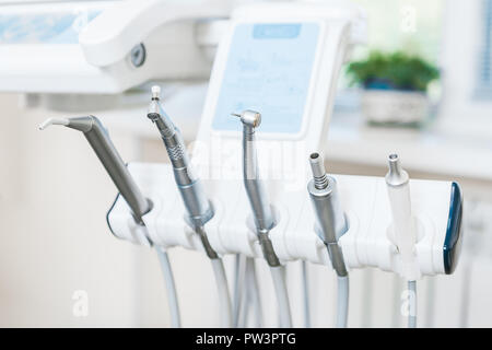 Different dental instruments and tools in a dentists office. Indoor Stock Photo