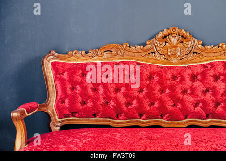 Detail of Luxurious antique red sofa Stock Photo