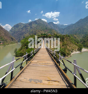 Beautiful wooden bridge over the Beas river in Aut Village in Kullu valley, Himachal Pradesh, India