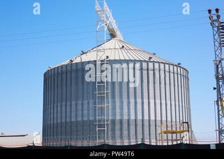 Agricultural Silo - Building Exterior, Storage and drying of grains, wheat, corn, soy, sunflower Stock Photo