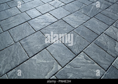 city rectangular gray paving tiles close up Stock Photo